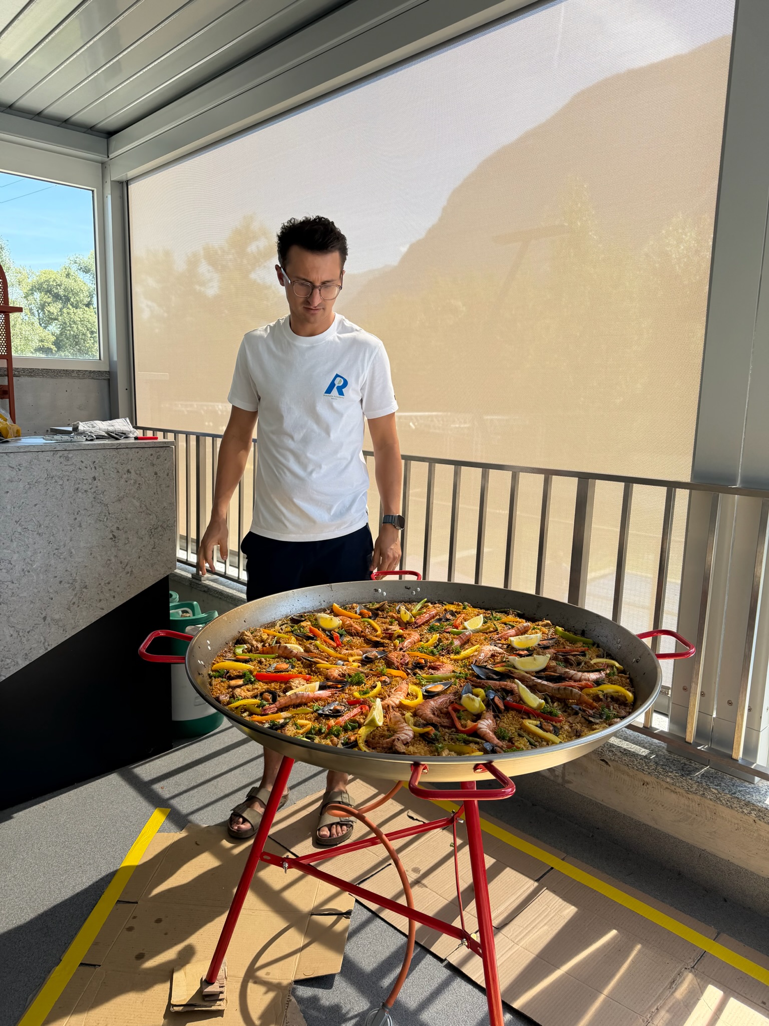 Fresh seafood paella cooked at Rackets Academy